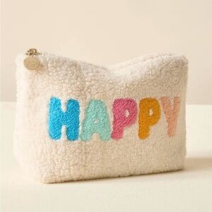 Cream Textured Zippered Bag with Colorful 'HAPPY' Logo